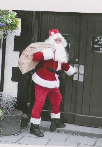 hire a santa to come to your front door