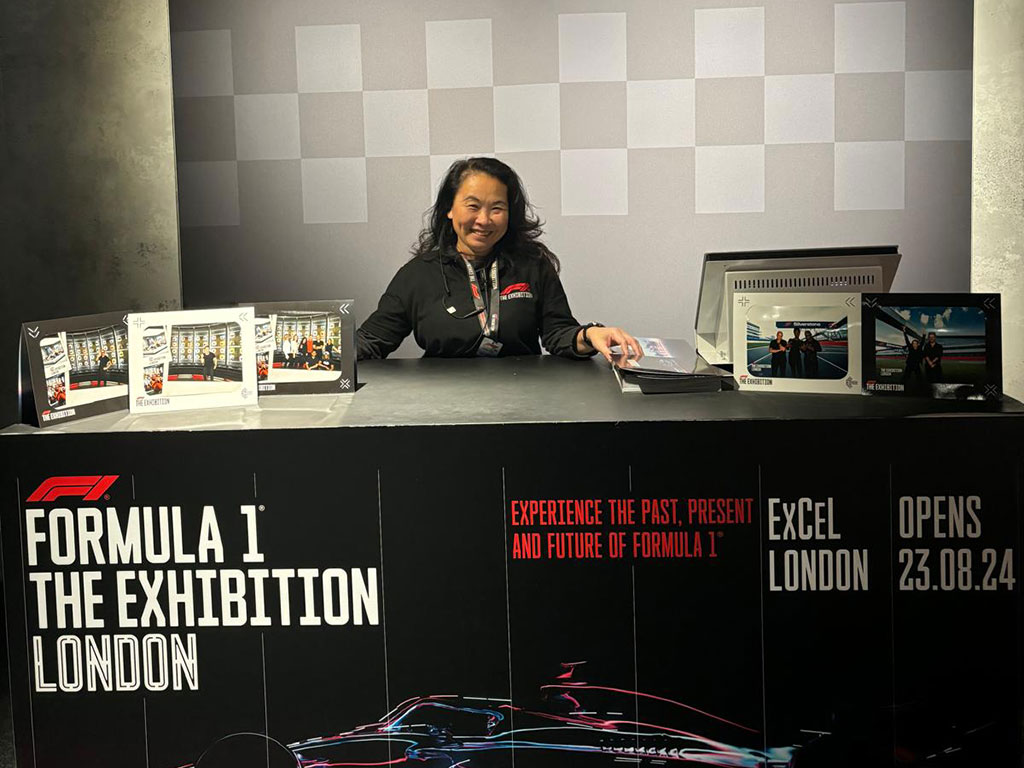 Immersive Event Staff 10 Event staff manning a desk at the Formula 1 exhibition in London